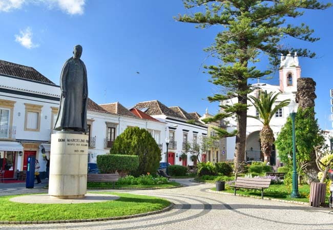 Statue of Dom Marcelino Franco in a garden square in Tavira
